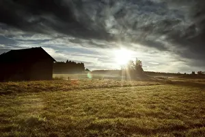 Autumn Landscape Drucke: An image of a nice autumn landscape with a dramatic sunset