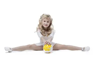 Isolated Female Athlete Drucke: Image of pretty little gymnast posing on split