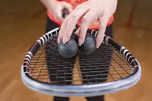 Active Lifestyle Photo Drucke: Image of racket and three squash balls