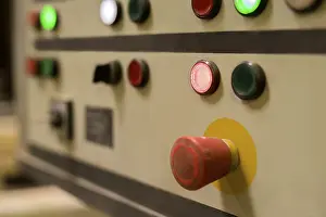 Industrial Building Interior Drucke: Image of red switch on remote control panel