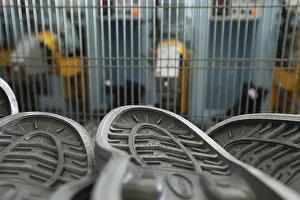 Industrial Shoe Production Drucke: Image of rubber soles in workshop, close-up