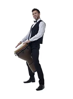 Studio Shot Musician Drucke: Image of smiling young drummer posing at camera