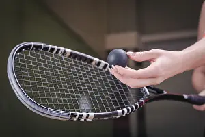 Tennis Equipment Drucke: Image of a woman's hand with a squash racket