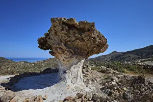 Southeast Europe Mountainous Region Drucke: Impressive rock formation rises in front of an extensive mountain range