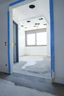 Construction Site Germany Drucke: Incomplete room with ceiling openings and windows