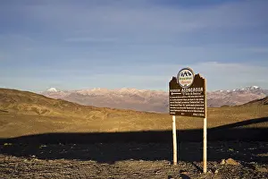 Cloudy Blue Sky View Drucke: Information panel with vulcan Aconcagua in the background