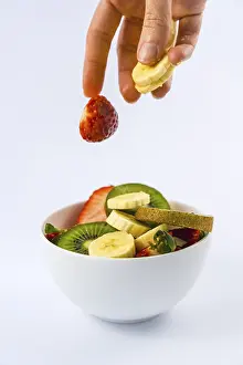 Vegetarian Starter Recipes Drucke: Introducing ingredients from above with a woman's hand
