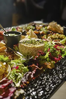 Empty Table Setting Ideas Drucke: An inviting array of various dishes and garnishes is artfully presented on a large platter
