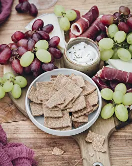 Fresh Fruit And Cheese Platter Drucke: An inviting snack platter featuring crisp crackers