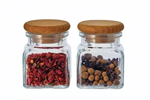 Healthy Nutrition Options Drucke: Two jars with spice isolated on white
