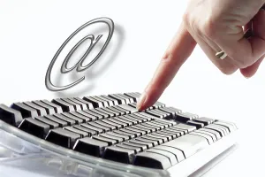Electronic Communication Technology Drucke: Keyboard and woman's hand