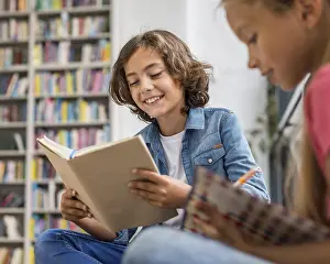 Young Boy Reading Drucke: Kids reading doing their homework