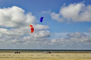 Danish Coastline Scenery Drucke: Kite buggy on the beach under a cloudy sky