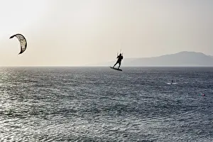 Andalusia Travel Images Drucke: Kitesurfer jumping, backlight, Tarifa