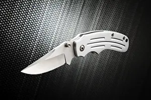 Studio Shot Of A Knife Drucke: Knife, flick knife