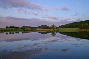 Castle At Sunset Drucke: Lake with reflection in spring with castle at sunset