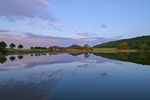 European Defence Work Drucke: Lake with reflection in spring with castle at sunset