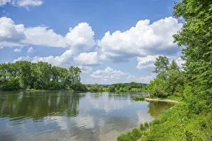 Danube River Landscape Drucke: Landscape of Danubia river with reflection of the landscape and Clouds