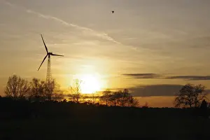 Ecofriendly Wind Power Plant Drucke: Landscape, wind generator, sunset