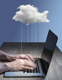 Cyber Crime Prevention Drucke: Laptop connected to applications in the cloud computing internet with furious typing suggestive of hacking