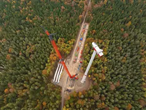 Ecofriendly Electricity Generation Drucke: Large construction site of a wind power project in a dense