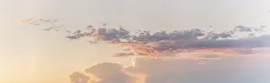 Cloudy European Scenery Drucke: Large pink cloud at sunset in spring