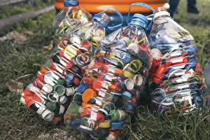 Waste Separation Techniques Drucke: Detail of large quantity of colored plastic bottle caps
