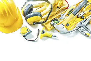 Close Up Detail View Drucke: Large set of yellow construction tools against a white background