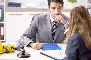 Office Communication Skills Drucke: Lawyer talking to client in office