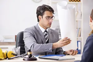 Jurisdiction Law Office Drucke: Lawyer talking to client in office