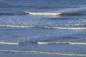 Sandy Ocean Beach Europe Drucke: Leaking waves on a sandy beach