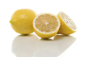 White Studio Background Photos Drucke: Two lemons white background with shadow