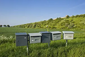 Cloudless Blue Skies Germany Drucke: Letter boxes in the middle of a field