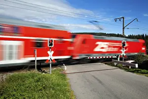 Southern Germany Rail Traffic Drucke: Level crossing with passing train