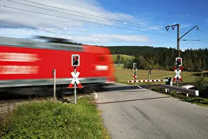 Transport In Central Europe Drucke: Level crossing with passing train