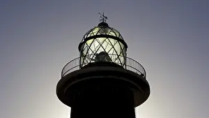 Barren Spanish Landscape Drucke: Lighthouse, backlight, close, upper part