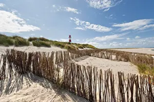 German North Sea Coast Drucke: Lighthouse with blue sky at Ellenbogen