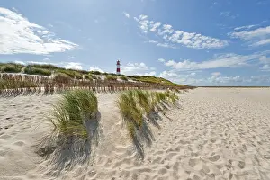 North Sea Coastline Images Drucke: Lighthouse with blue sky at Ellenbogen