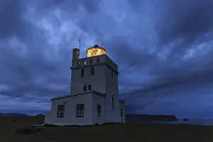 European Coast Photography Drucke: Lighthouse at the coast, twilight