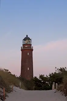 Evening Atmosphere Germany Drucke: Lighthouse in DarBer Ort in the evening