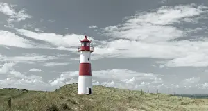 German North Sea Island Scenery Drucke: Lighthouse in the dune landscape at Ellenbogen