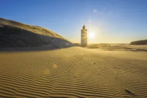 North Jutland Lighthouse Drucke: Lighthouse and Dune Rubjerg Knude with Sun
