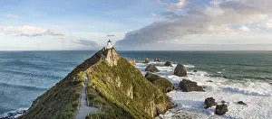 Wave Crashing Rock Formation Drucke: Lighthouse at Nugget Point, Catlins