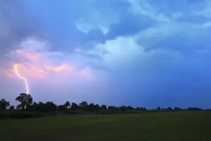 Stormy Atmosphere Drucke: Lightning striking the ground