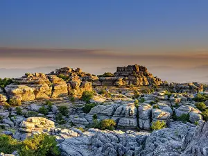 Sunset In Spain Drucke: Limestone rock formations at sunset