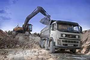 Uninhabited Construction Area Drucke: Loading a large lorry building material