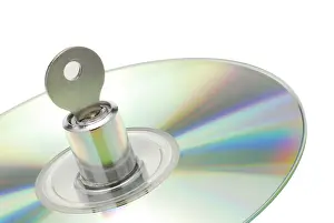 Data Theft Prevention Drucke: Lock with key in a CD