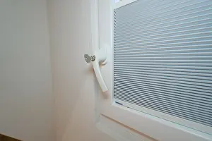 Modern European Architecture Style Drucke: Detail of a lockable white window handle with integrated blind