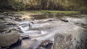 Evening Sun Water Scene Drucke: Long exposure of the mountain river in the rays of the setting sun