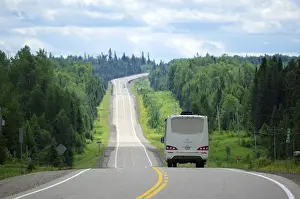 Canadian Landscape Photography Drucke: Long road through dense forest